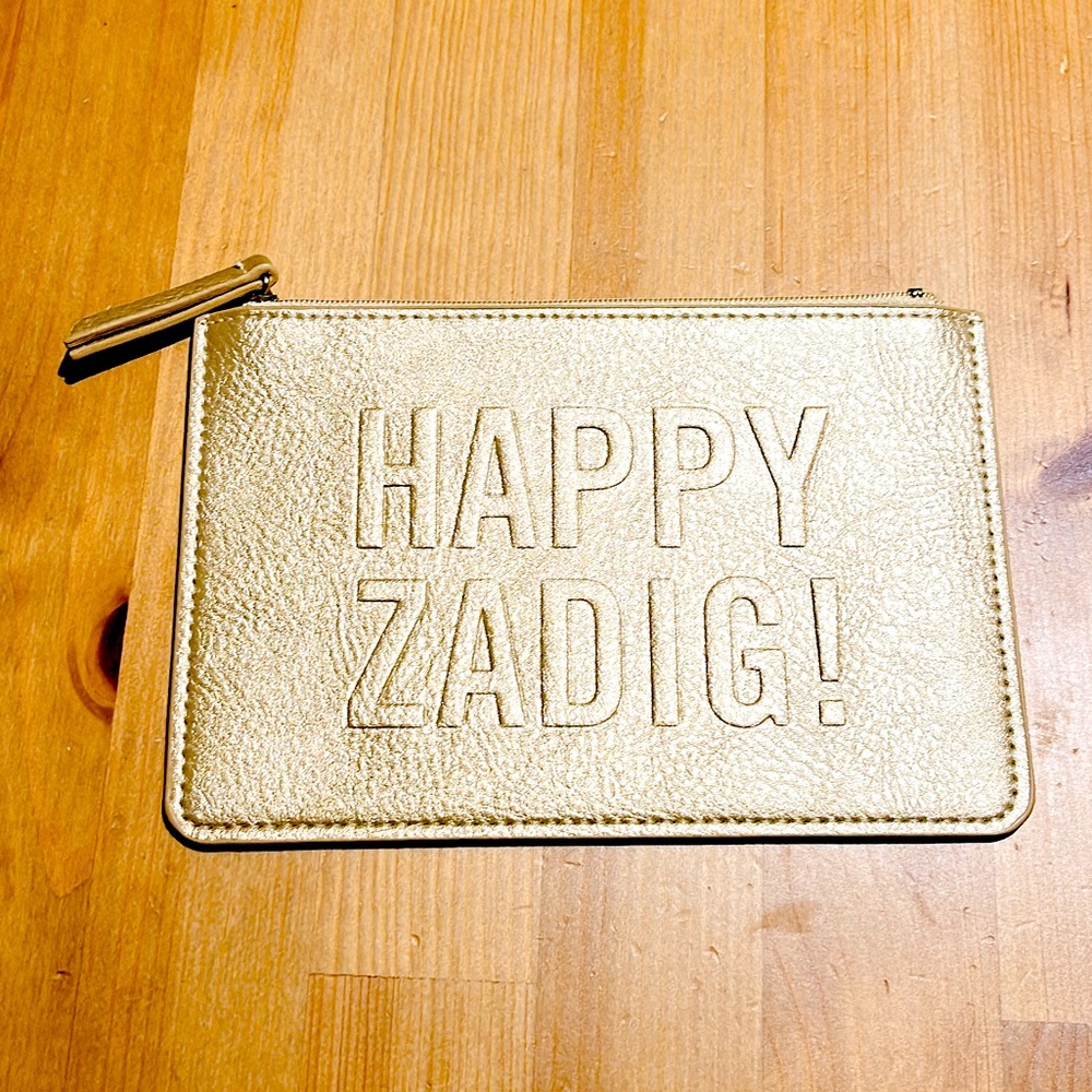 BN Zadig et Voltaire clutch/wristlet. Gold and textured.